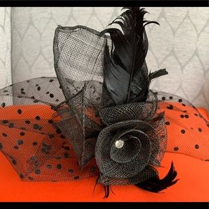 Elegant birds nest headband with feather detail